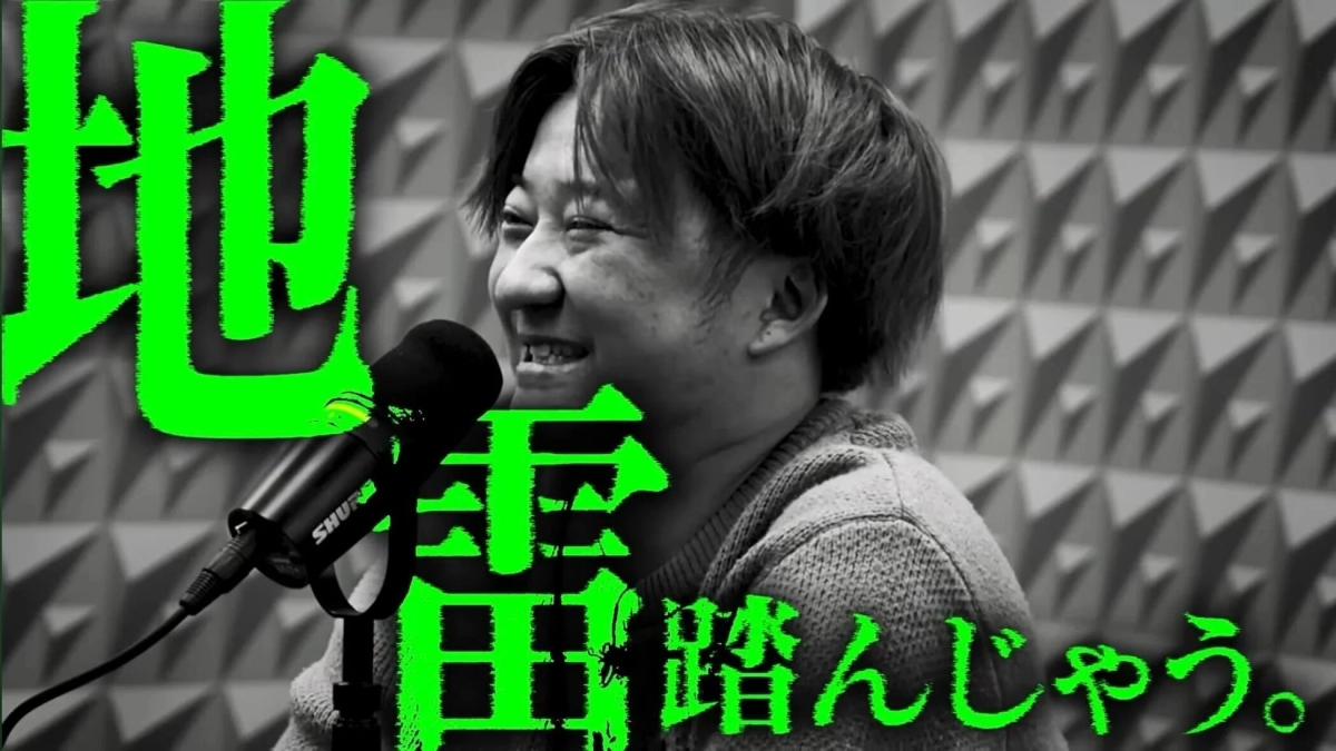 マイクに向かって話す古德氏